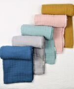 organic-manufacture- Organic Doubleface Two Layer Pompommed Blanket Mint